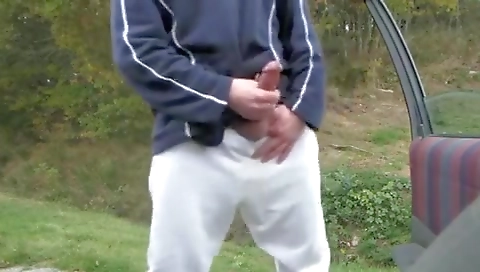 Sexy young blonde in the park